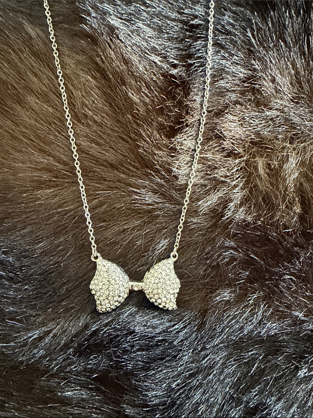 Crystal Bow Pendant Necklace - Silver Tone